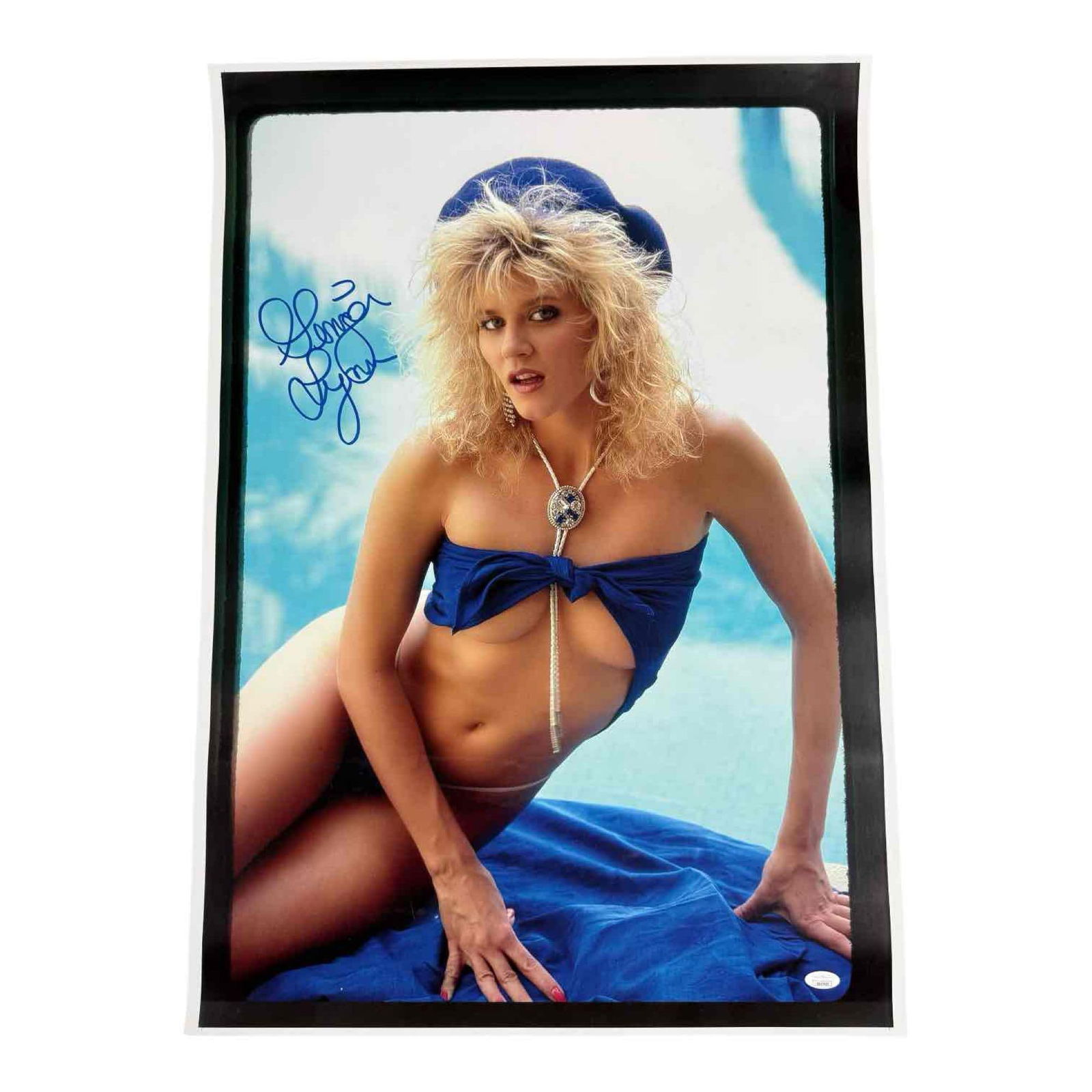 Ginger Lynn Autographed Poster Sized Color Photo JSA: Approx 29x21 color photo of the adult model and entertainment star. Amazing blue marker signature. JSA certified.