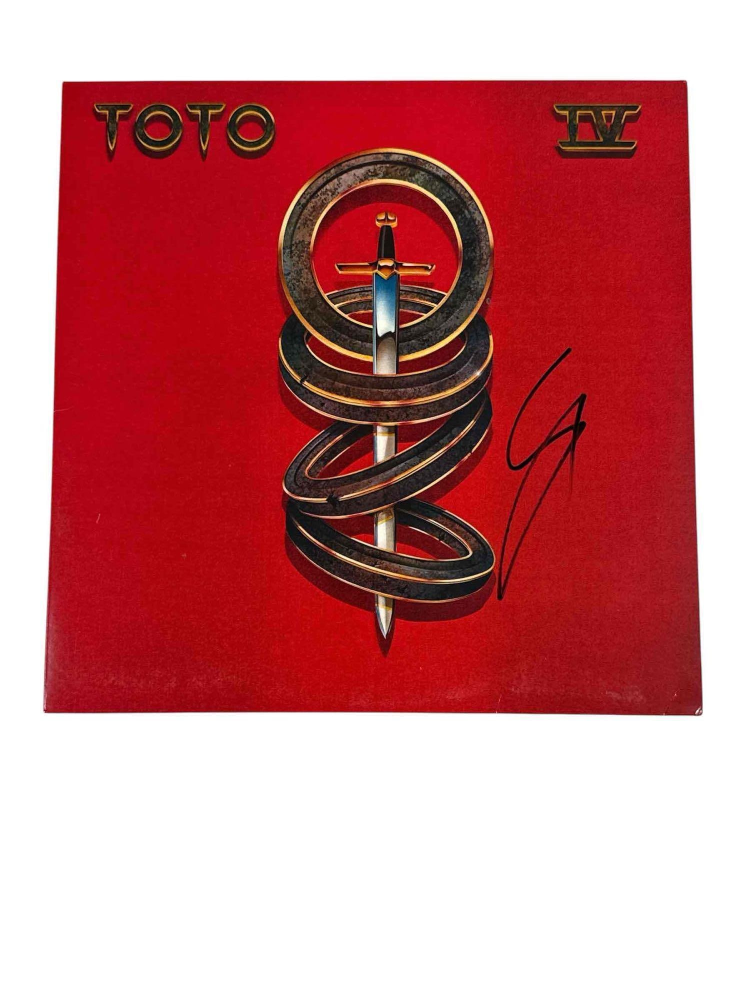 Steve Lukather Autographed TOTO IV Vinyl Album Cover: Lead guitarist and one of the founding members of Toto. Steve signed this album cover in black marker. IV was released in the 1970's. This is a later issued album. JSA certified.