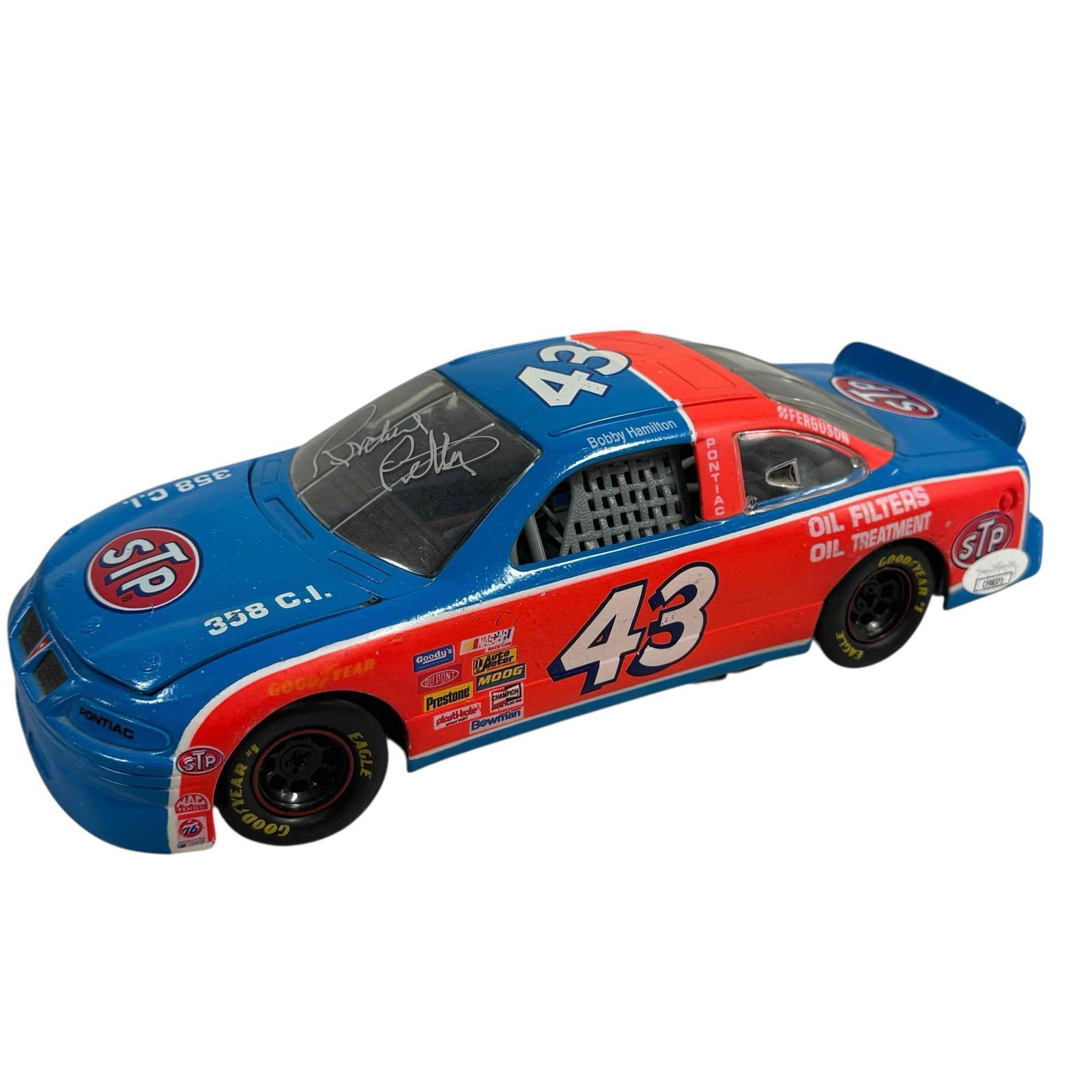 Richard Petty Signed 1984 Nascar Diecast Car #43 JSA: Bobby Hamilton 1/24 scale die cast car signed on the windshield in silver by the icon. JSA certified.