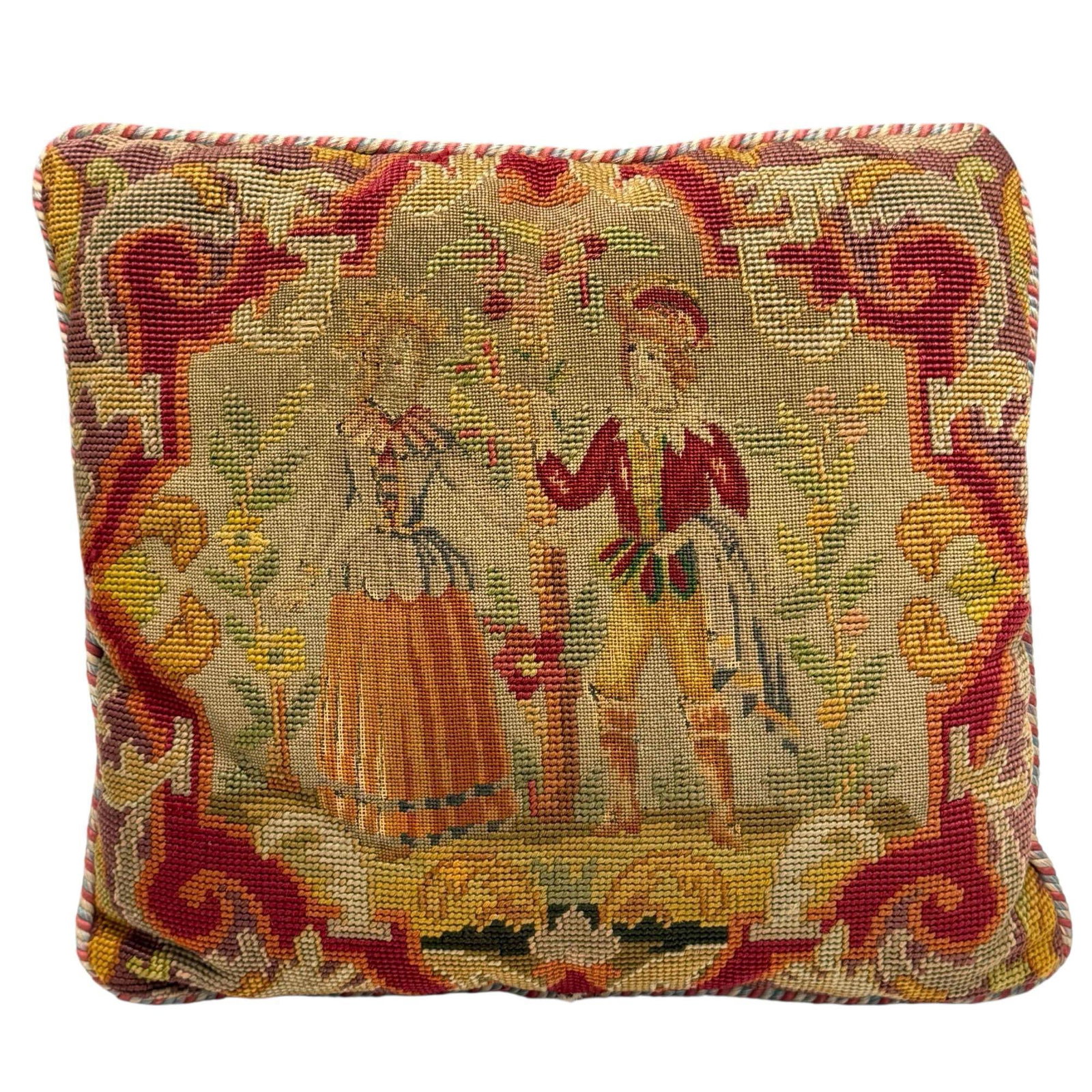 French Romantic Couple Scene Needlepoint Throw Pillow: Featuring young romantic couple among flowers with a braided cord pipe border and pink checker board back. Measuring approx. 19" tall by 16.5" wide. In good vintage condition, see photos.