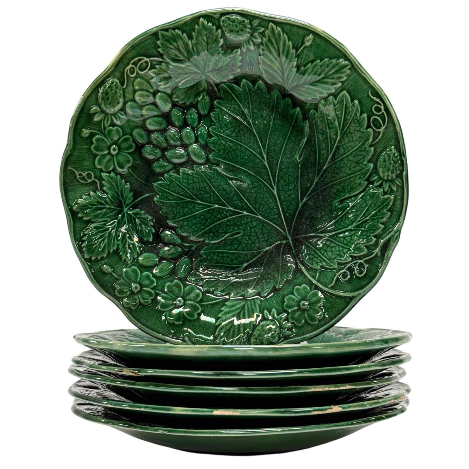19th Century Majolica Green Strawberry Dessert Plates (6): Set of six English Majolica G.F. Bowers Tunstall green strawberry and grape clusters dessert plates. Measuring approx. 7.25" diameter. In good age appropriate condition with some rim chips, see photos