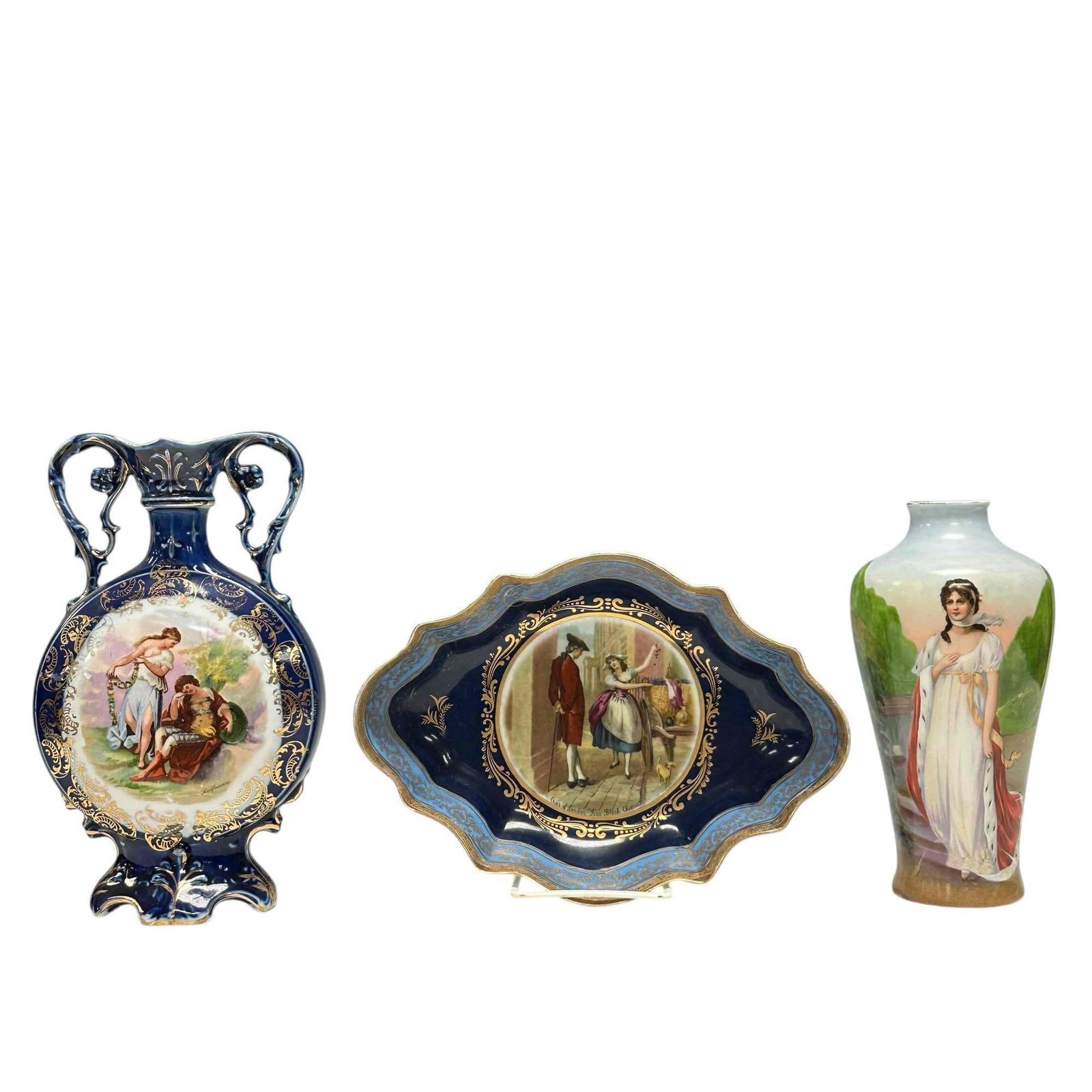 Carlsbad Austrian, German and Imperial Porcelain Group: Including Carlsbad flat form vase approx 10" tall, Elegant and classy woman standing in landscape German vase approx 8" tall and a Imperial shapely dish approx 10" x 7". All in good light use and wear