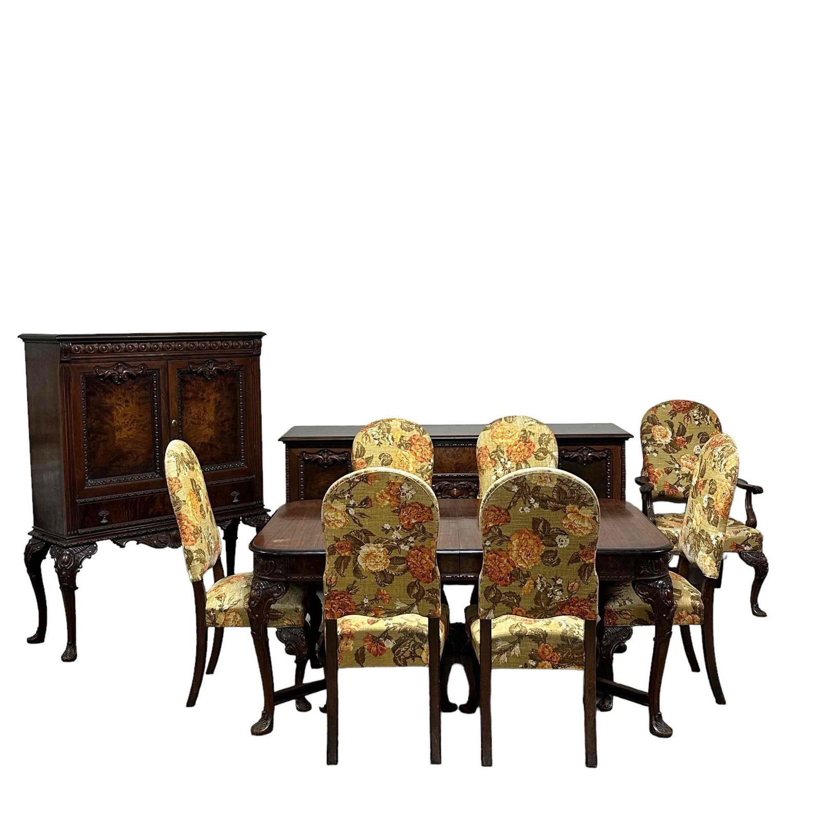 10pc Carved Walnut Dining Room Set: 19th Century, carved walnut dining set comprising of a blind door server on legs, carved 6ft long sideboard buffet, table two leaves (issues losses to leaves) and 7 chairs. Scuffs and minor wear scatt
