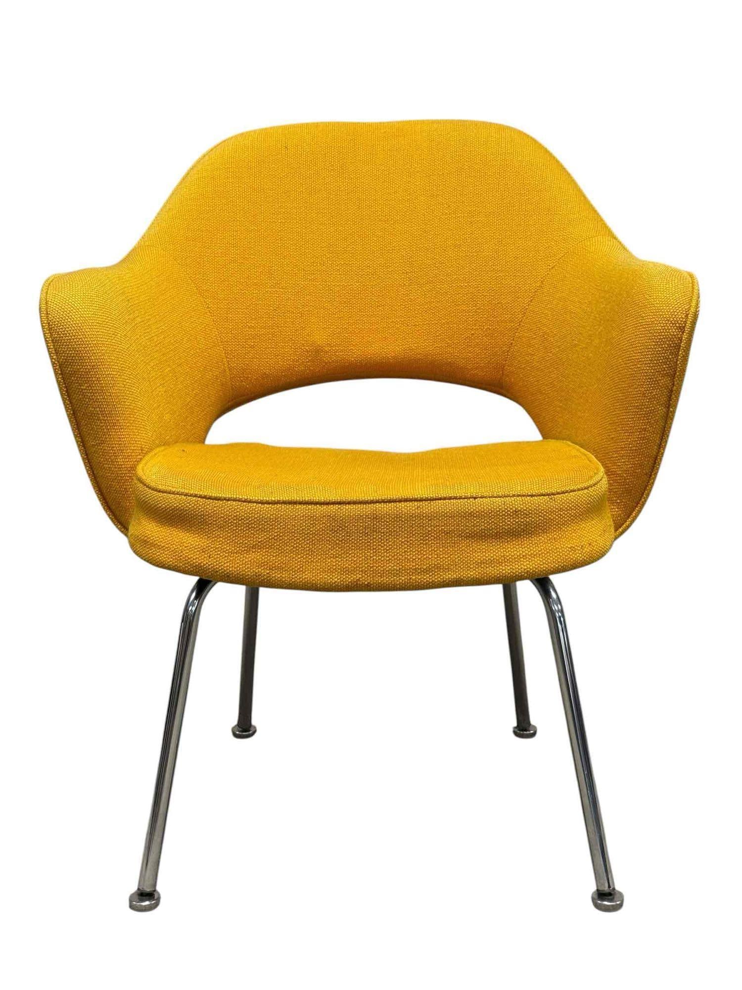 Mid Century - Knoll Saarinen Executive Arm Chair: Mid 20th century, KNOLL chair measuring approx 32 in h x 26.5 in w x 23 in d. Seat height is 17 in. Condition is good with minor fading and soil to upholstery. See photos for details as shown