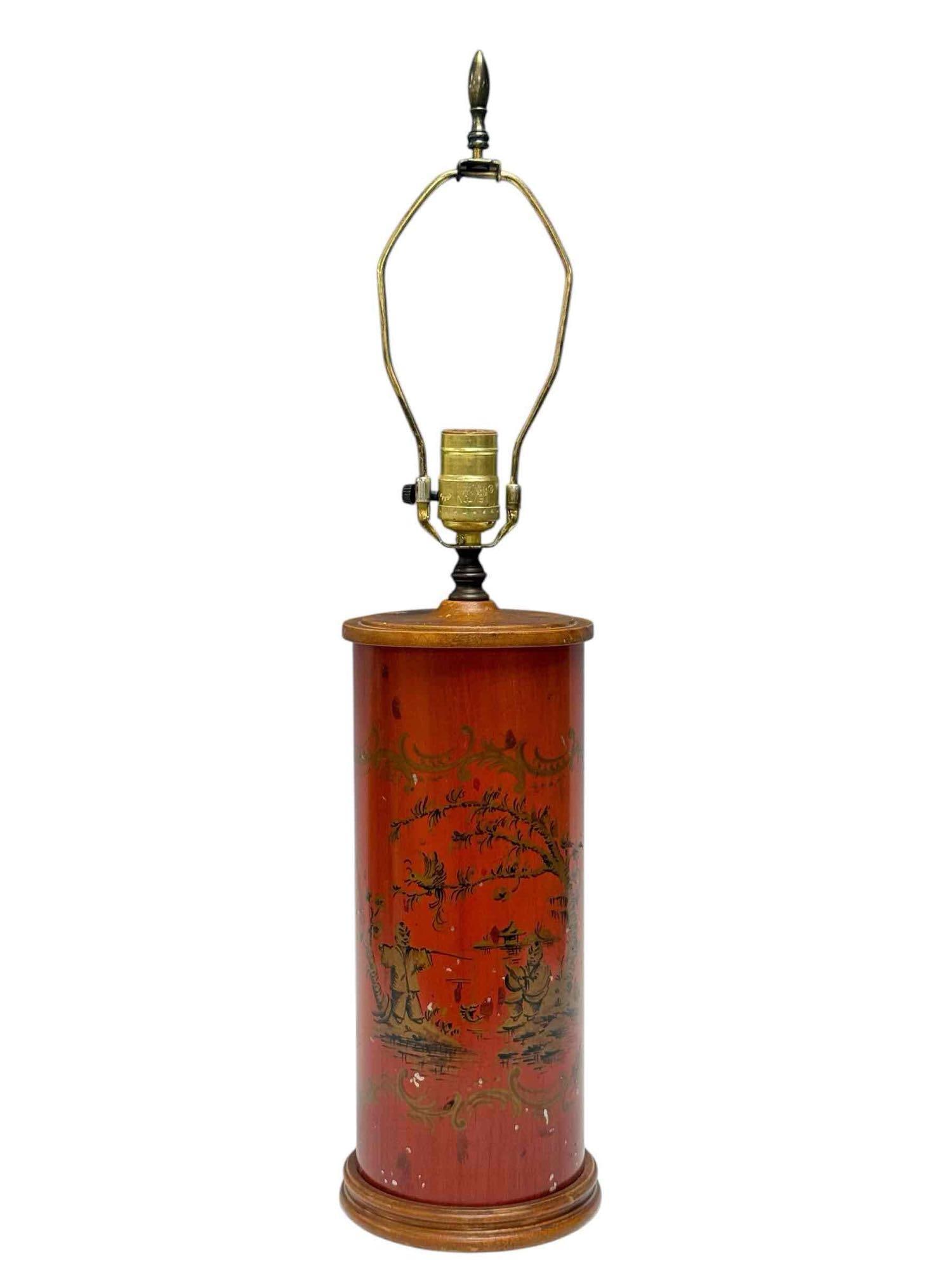 Chinoiserie Hand Painted Cylindrical Table Lamp: Mid to late 20th century Chinoiserie hand painted cylindrical table lamp on wood base and top. Scene depicting Asian men fishing in golden bronze tone. Measuring approx. 25.5" tall to top of finial. H