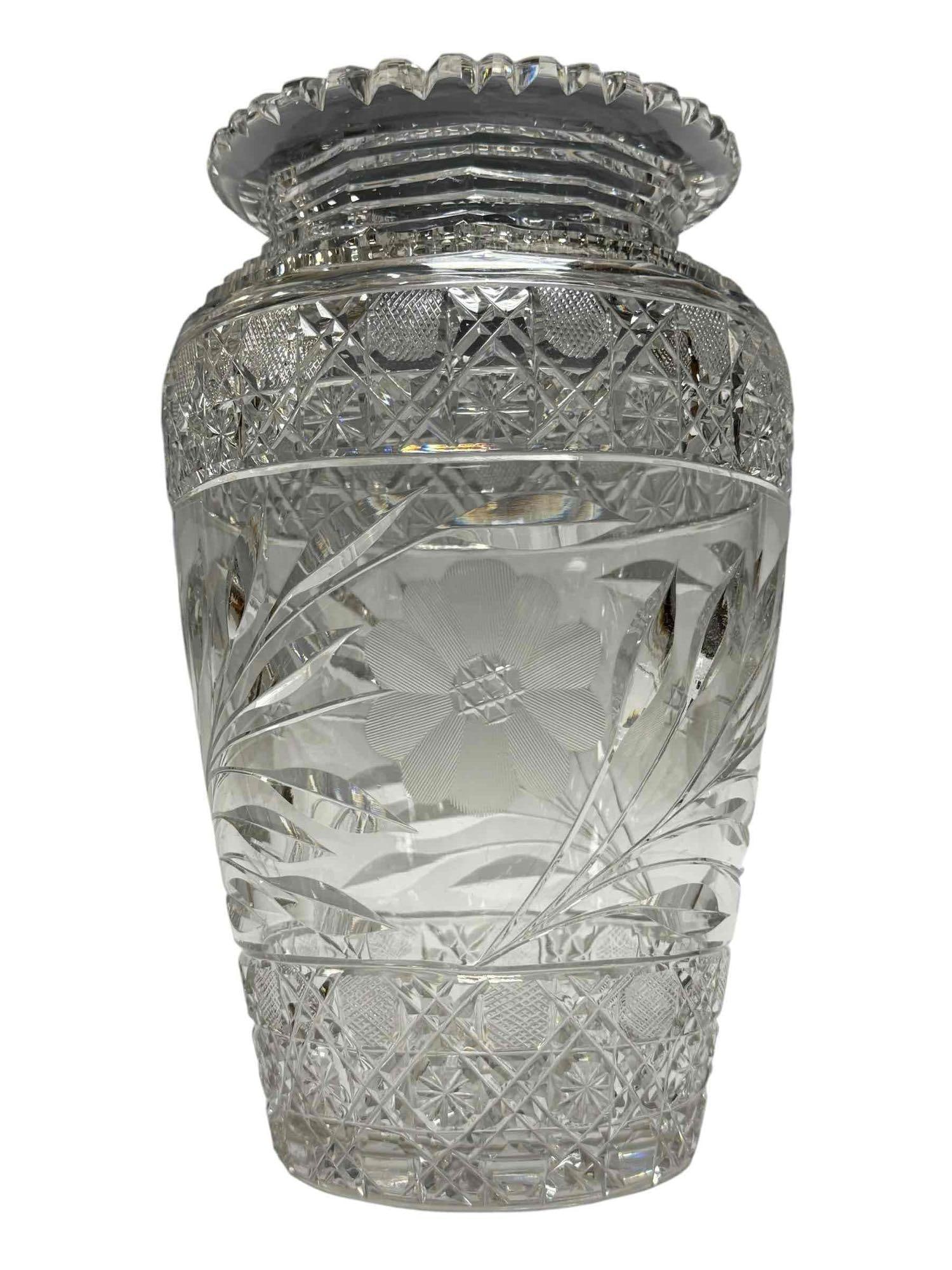Bohemian Cut Glass Vase Attributed to Moser: Large cut glass floral motif crystal vase attributed to Moser. Having daisy and pinwheel decor with flared top and bulbous body. Measuring approx. 10.75" tall. In good age appropriate condition, see p