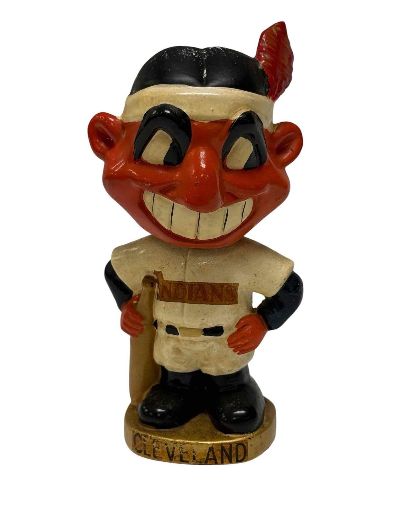 1968 Cleveland Indians Chief Wahoo Gold Base Bobblehead: The Chief! A must have for any baseball collector, regardless of condition. This guy has seen some good days - and some Cleveland days! Some paint loss to the top of the head and some light signs of a
