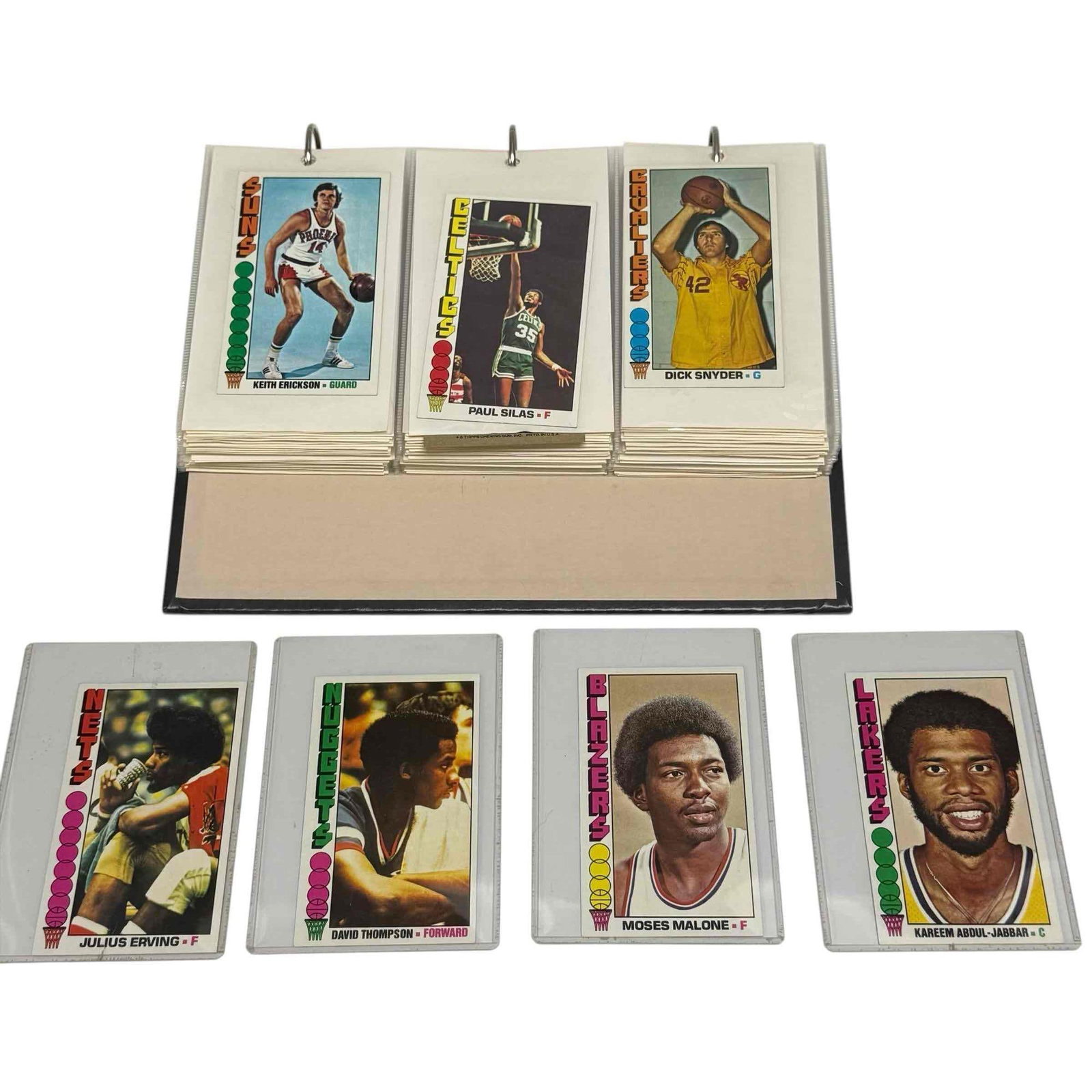 1976-77 Topps Basketball Card Complete Set: Popular issue features oversized cards of some of the game's all time greats including Dr. J, Bobby Jones, McAdoo, Kareem, David Thompson rookie card, Unseld, Malone, Lanier, Archibald, Cowens, Bradle