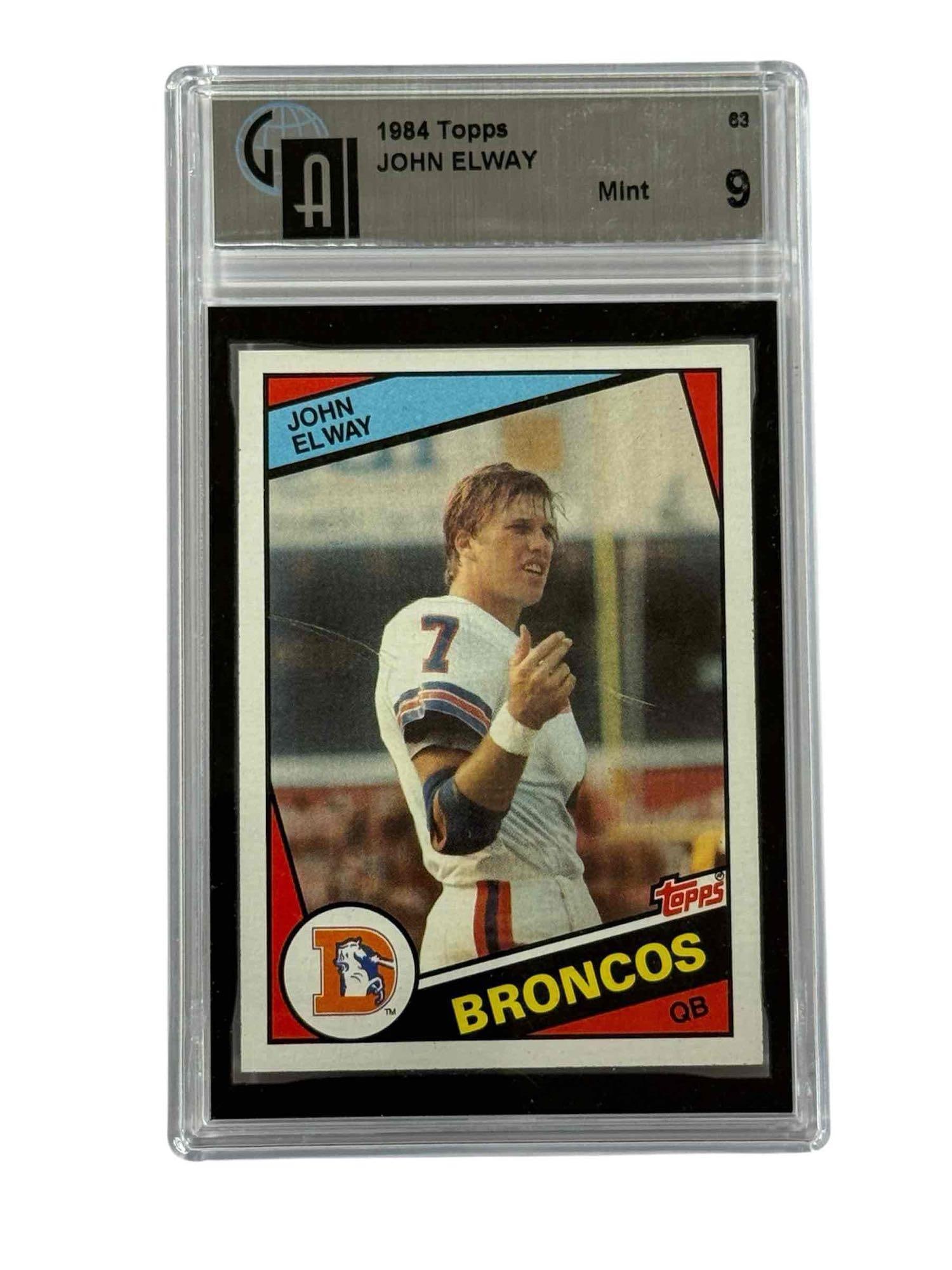 1984 Topps #63 John Elway Rookie Card GAI 9 MINT: MINT 9 grade by Global on the iconic rookie card. Scufs noticed on case.