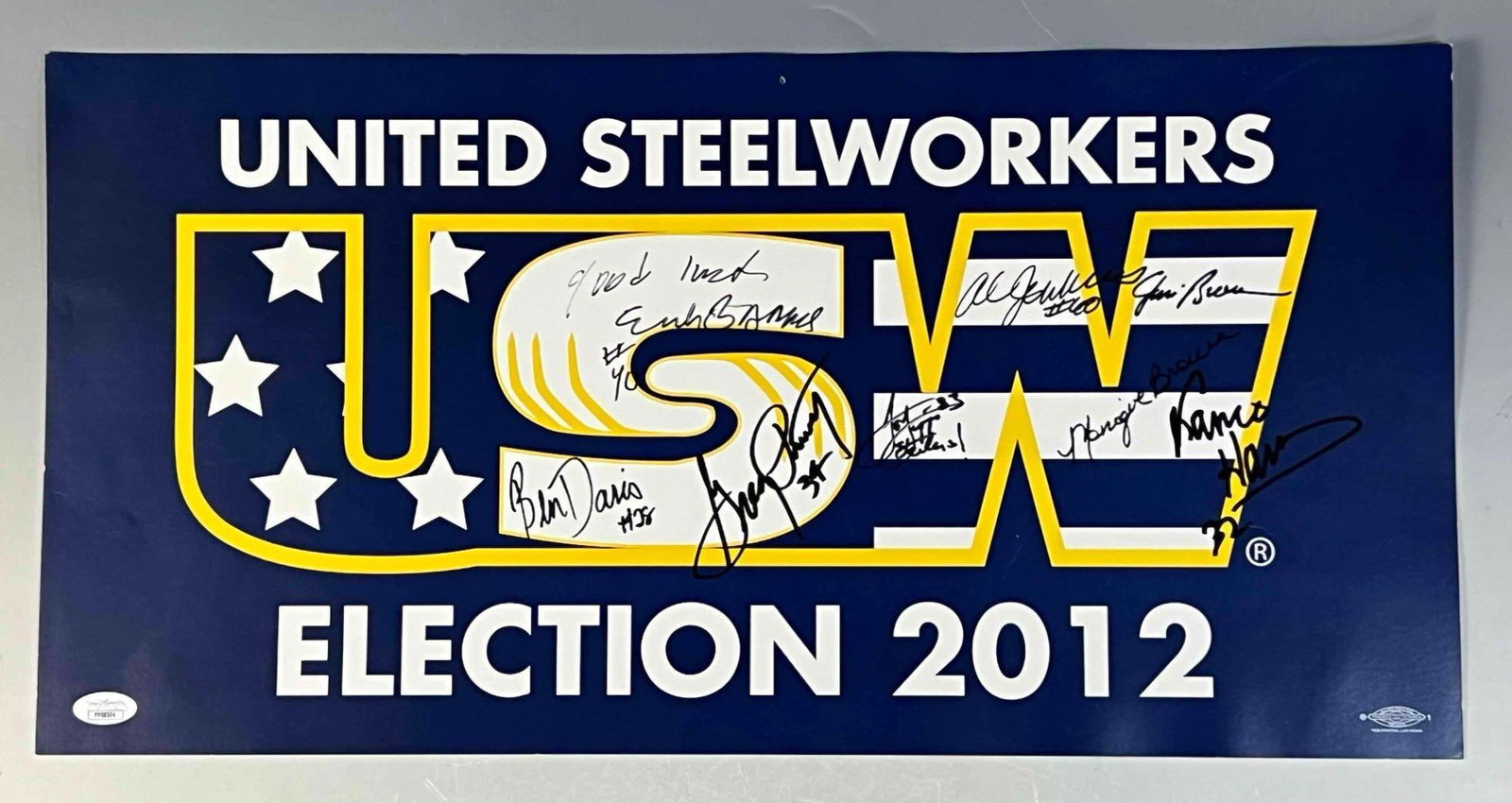 2012 Election Sign with Autographs of Jim Brown, his Wife and HOF'ers: A very unique item for several reasons! Jim Brown and his wife Monique have signed it! Definitely not something you see everyday! Also signed by former NFL players Franco Harris, Ben Davis, Greg Pruit
