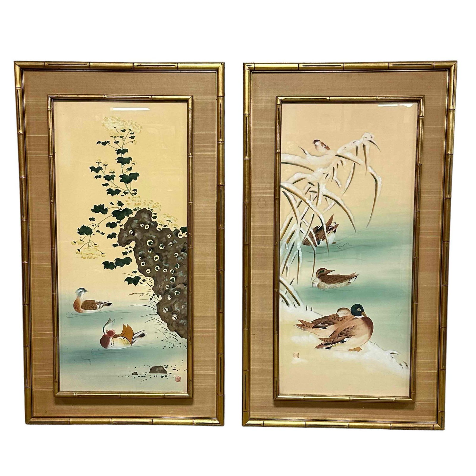 Pair of (2) Japanese Mixed Media Paintings: A fine pair of 20th century Japanese painting ducks and birds one features a winter setting while the other is appears to be spring. Both stamped as shown and set in period gilt bamboo style frames. M