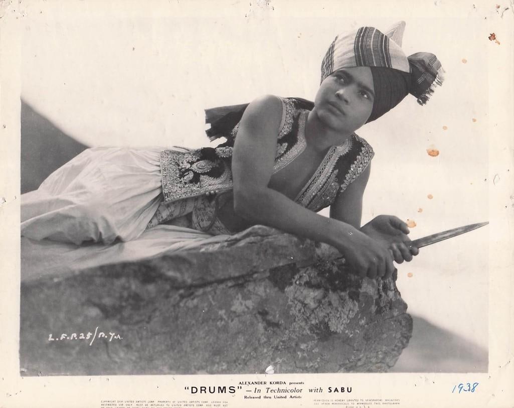 Drums - Stills: Quantity: 21 Year: 1938 Condition:B+ Country: U.S.A Studio: United Artists Size: 8x10 Genre: War Stars: Sabu, Valerie Hobson, Raymond Massey, Alexander Korda