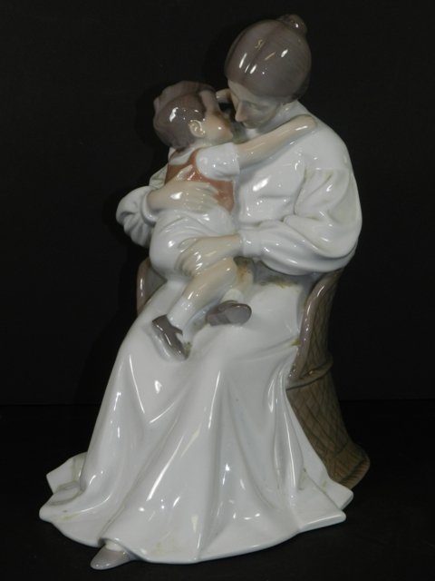 Royal Copenhagen Bing & Grondahl Mother Love: Large 12" tall porcelain figurine by Copenhagen B&G 1552 of young mother and child. Condition is good.