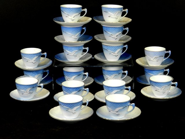 18 Royal Copenhagen Seagull B & G Demitasse Cups: Seagull motif pattern in these 18 demitasse cups & saucers. One with hairline in saucer as shown, minor wear.