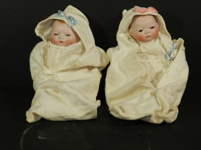 2 Bye Low Baby Twins by Grace S. Putnam: (2) Bye Low Baby Twins by Grace S. Putnam 10" long, Bisque heads Boy: minor marks on cheek, blue eyes Girl: Eyes inside dome head, face in great condition