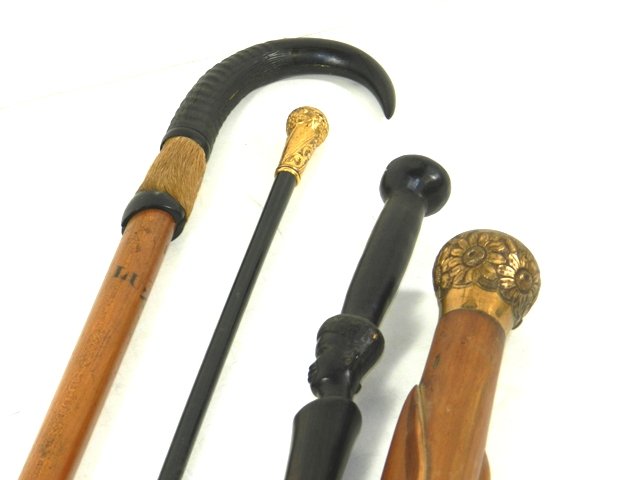 Collection of 4 Various Carved Walking Canes: Collection of 4 Various Carved Walking Canes with minimal signs of use and wear. Approx 32" -37".