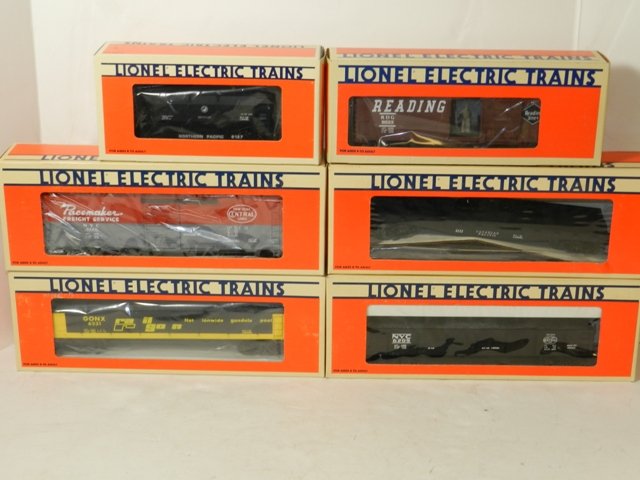 6- LIONEL MODERN TRAIN CARS: 6- LIONEL MODERN TRAIN CARS. 6-6127, 6-9223, 6-6209, 6-9469, CANADIAN PACIFIC FLAT CAR, NYC ORE CAR. ALL NEAR MINT BOXED