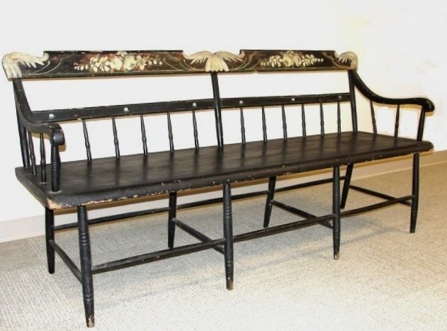Mid 19th C. Painted Settee American Ca. 1850: Paint-decorated, Pennsylvania, plank-seat settee of the mid 19th century (1845-65) in the half-spindle-back style with an angel wing crest rail. The black background is trimmed out in cream white flor