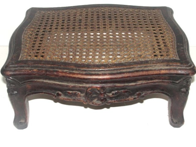 French Carved Lace Cane Footstool Ca. 1900's: Condition very good with minor chip on one leg and normal wear. 6 1/2'' x 14'' x 11 1/2''.