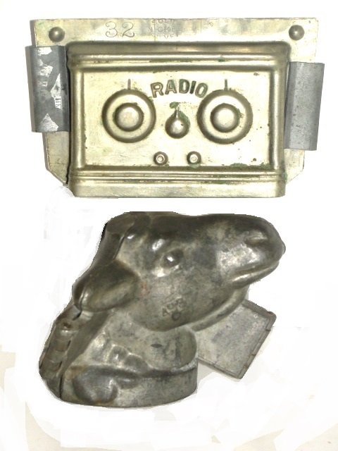Chocolate Candy Radio And Lamb Head Molds: Stamped Nickel Silver # 32 Clamp hinge rare radio mold. 3'' x 5'' x 7/8''. Aluminum or base metal 3 part folding hinge lambs head candy mold. 3'' x 3'' x 2''. Both in near mint condition.