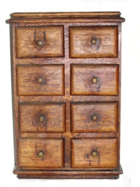 Country Oak 8 Drawer Spice Cabinet Ca. 1880's: Having a molded top and bottom with brass knobs. Condition good with allegation over entire case. With several older spice containers in drawers. H. 16'' W.10 1/2'' D. 4 1/2''.