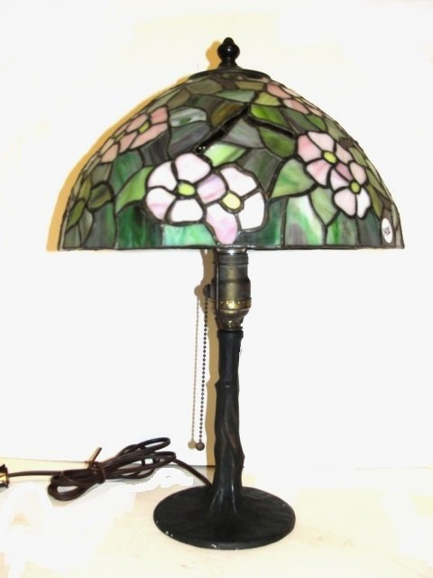 Signed Handel Leaded & Stained Glass Lamp: Tree trunk base stamped handel with unsigned leaded lead & copper foil shade with poppie style flowers. Condition very good. H. 18'' Shade 6 1/2'' x 12''