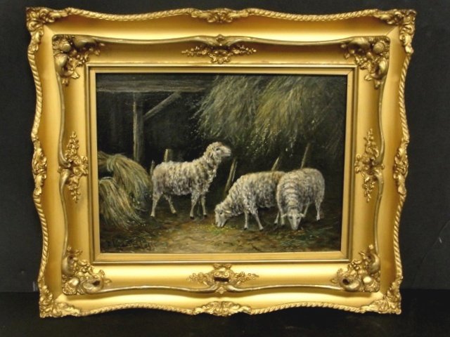 Signed O/C Sheep In Barn In Period Gilt Frame: Showing three sheep feeding on hay in barn setting. Eligible signature. Condition very good.