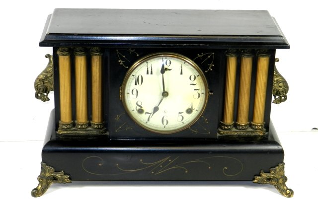1890s Gilbert Mantle Clock: Three column sides, bubble glass front face. Eagle style side finials. Not working.