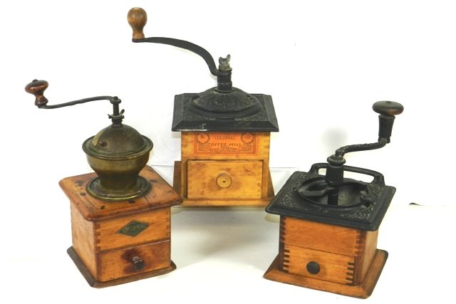 Three Antique Country Coffee Grinders: Two have cast iron tops with exception cranks, one with brass top (Leinbrock Werke) doesn't turn.
