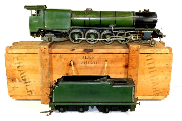 32" 1890's Large Scale French Steam Engine w/Tender: Steam engine is marked TREFIELD 3847. 32" long. Extremely heavy with all original parts. Front four wheel truck (diameter 1 3/4"), 8 center wheels (diameter 3 1/2"), double wheel rear truck (diameter