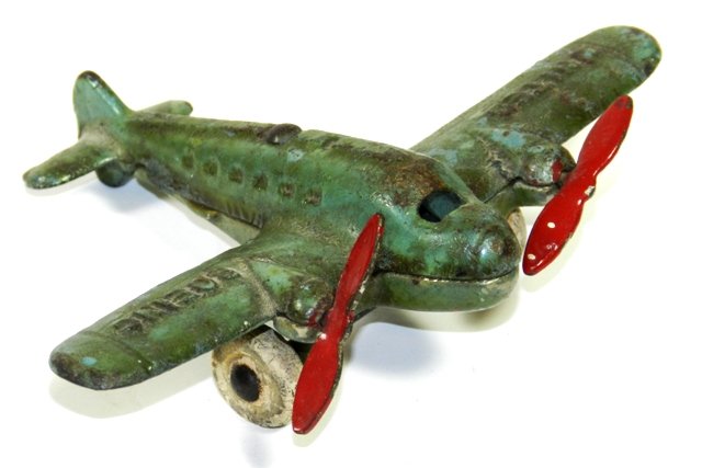 Arcade Mfg. Co. AMC 361 United Boeing Cast Iron: Arcade Mfg. Co. AMC 361 United Boeing cast iron airplane in original condition. "United and Boeing" in raised letters on wing top and "AMC / 361" underneath. Two props and two rubber tires. Measures a
