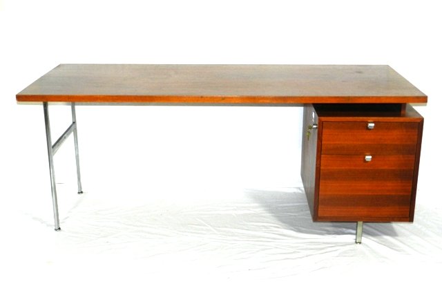 George Nelson - Herman Miller Mid Century Desk: Desk, USA, 1950s; Walnut, zinc-plated steel, laminate; Foil label; 30" x 60" x 30"