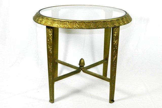 Small Round Cast Iron Art Neaveou Table: Table has center pineaplle finial. Gold Painted cast iron with glass top. Approx 19" tall x 20" wide. Very good condition. Ca.1890-1910