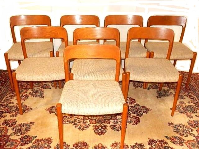 AS Skovby Set Of 8 Danish Modern Chairs: A set of eight Danish mid-century modern dining chairs manufactured by Skovby MÃ¸belfabrik. They made Burmese teak wood. This design is Scandinavian from the minimalistic form to the deeply curved b