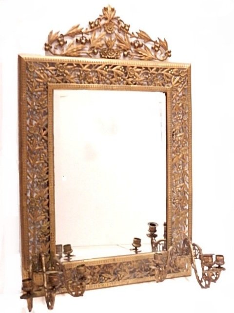 Antique Bronze Renaissance Mirror / Scone: Having arched peak crest surrounded with foliate and Holly Berries designs around the top and sides, beveled mirror with 6 removable candle arm. Condition overall good, light oxidation with good aged 