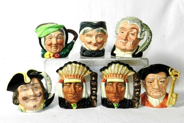 Group of Seven Smaller Royal Doulton Toby Mugs: Included is D6469 Capt. Henry Morgan, D6504 The Lawyer, D6384 Granny, D6577 Gaoler, D6614 North American Indian (2 of them), plus an old lady (no number/name). All 3" to 4" tall Condition good no crac