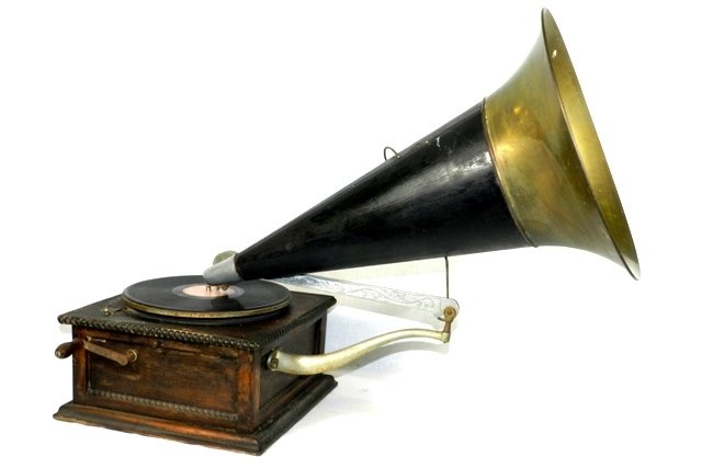 Early Antique Phonograph: Early antique phonograph in working condition, missing needle and horn latch broken. Phonograph case 12.75" x 12.5". Horn length 23".