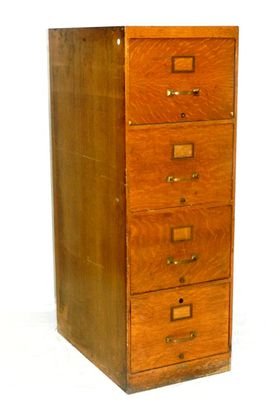 Globe-Wernicke Four Drawer Filing Cabinet: Golden oak 4 drawer file cabinet, with metal interior drawers. Normal use and wear, with some visible wear to finish areas as shown and noted in photos. H 52.5" x 18" x 28".