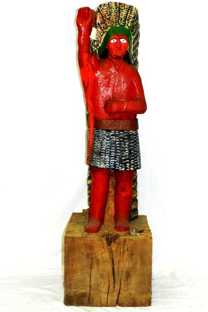Large Indian Chief Store Display Statue: Hand carved and painted wooden cigar store style Indian reproduction. 52". Several splits and cracks in wood.