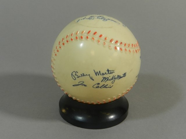 1950's New York Yankees Baseball Bank: Plastic baseball from an Erie, PA bank, featuring facsimile autographs of ten Yankees including Mickey Mantle, Casey Stengel, Ed (Whitey) Ford, Larry (Yogi) Berra, Billy Martin, Phil Rizzuto, others.