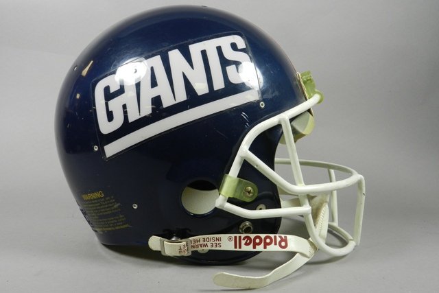 New York Gians Style Full Sized Riddell Helmet: Size 7-5/8, model WD1 helmet in the fashion of Phil Simms with similar facemask and "11" on back of helmet. Minor signs of usage. Nice piece for autographs!