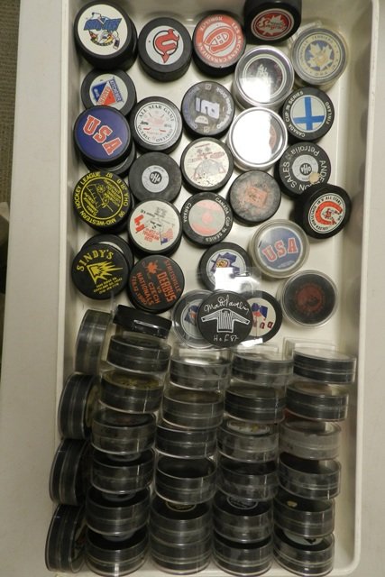 Collection of Minor League Hockey Puck: Approx 67 minor league hockey pucks as shown.