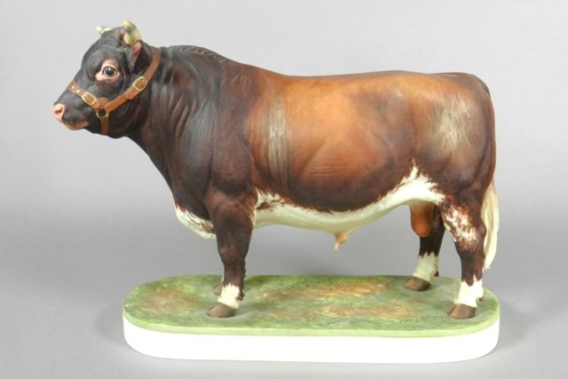 Royal Worcester 'Diary Shorthorn Bull' Porcelain: Boehm porcelain bull figurine, 'Dairy Shorthorn Bull,' modelled by Doris Lindner, copyright 1965. H 8" x W 11". Like new condition, no chips or cracks.