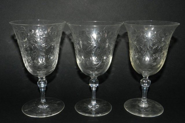 Webb Stemware Wine Glasses (15): Thomas Webb, England, wine glass stems with etched floral motif, signed. Overall good condition. Approx. 5.75".