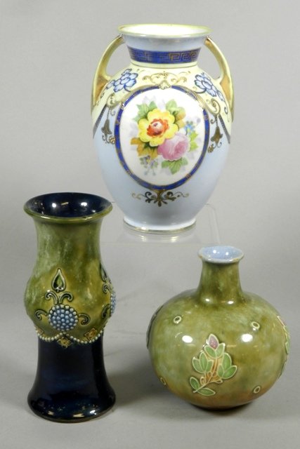 Two Royal Doulton Vases and Nippon Vase: Two Royal Doulton stoneware vases, signed, spill vase marked "629, BB6," bud vase marked "8491, a." Nippon vase hand painted with floral motif and raised gilt decoration. Tallest H 6". Overall good co