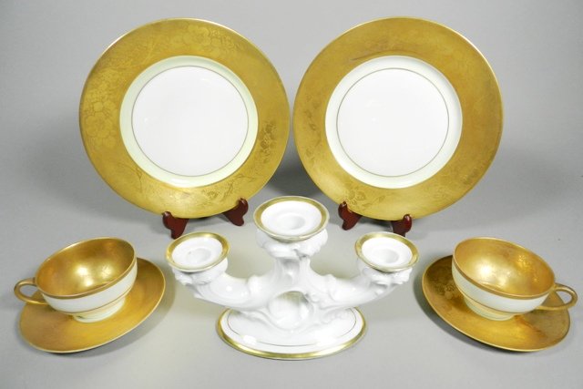 Hutschenreuther Selb ''Favorite'' Dinnerware Set: Hutschenreuther Selb, Bavaria, gilt rim with etched floral design dinnerware set, "Favorite" pattern, including: 6 cups and saucers, 8 dinner plates, and 1 candlestick of a different pattern.