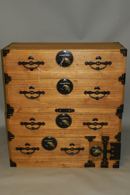 Japanese Tansu Two Piece Chest: Japanese Tansu two piece clothing chest, cast iron hard wear and fixtures, kiri and cedar wood. Two piece chest sits on top of one another, cast iron fixtures and hardware with locking drawers and key