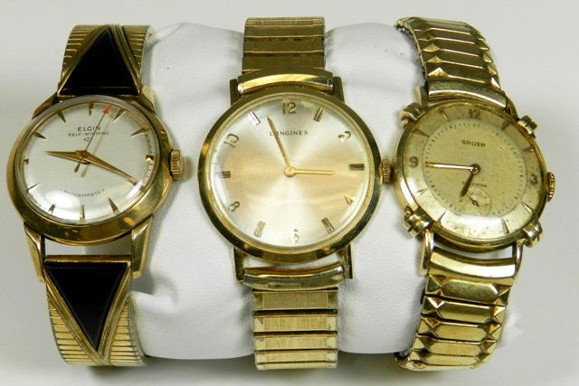 Three Vintage Men's Wrist Watches: Includes: Gruen Precision 14k Gold Case Wrist Watch, Longines 14k Gold Case Wrist Watch, and Elgin self-winding Shock master. Overall good condition, Elgin keeping time and others not tested.