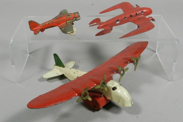 Collection of 3 Toy Airplanes ~ Hubley: Including Hubleyu #2227 3" plane, 7" 4 propeller prop plane and a twin engine style 4" plane. Original paint and normal use and wear.