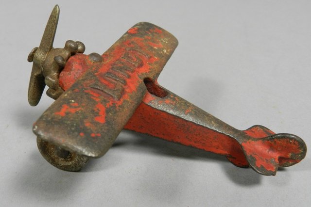 Lindy #1720 Cast Iron Plane: Approx. 4" in length, normal wear and a replacement prop as shown.